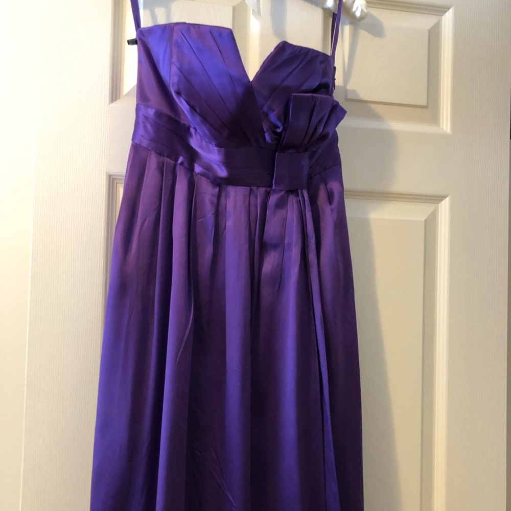 Gorgeous purple bow gown!